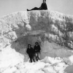 Kids playing on an Ice shelf on lake MI, vintage pic.