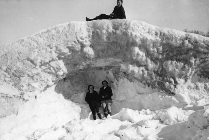Kids playing on an Ice shelf on lake MI, vintage pic.